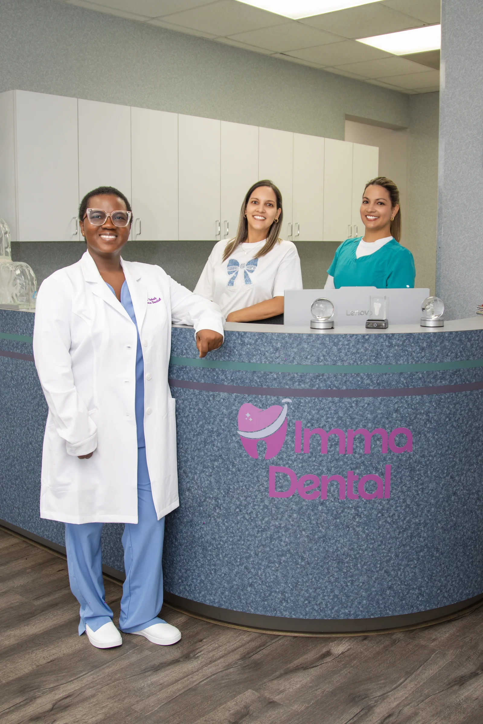 The Imma Dental team at the reception desk