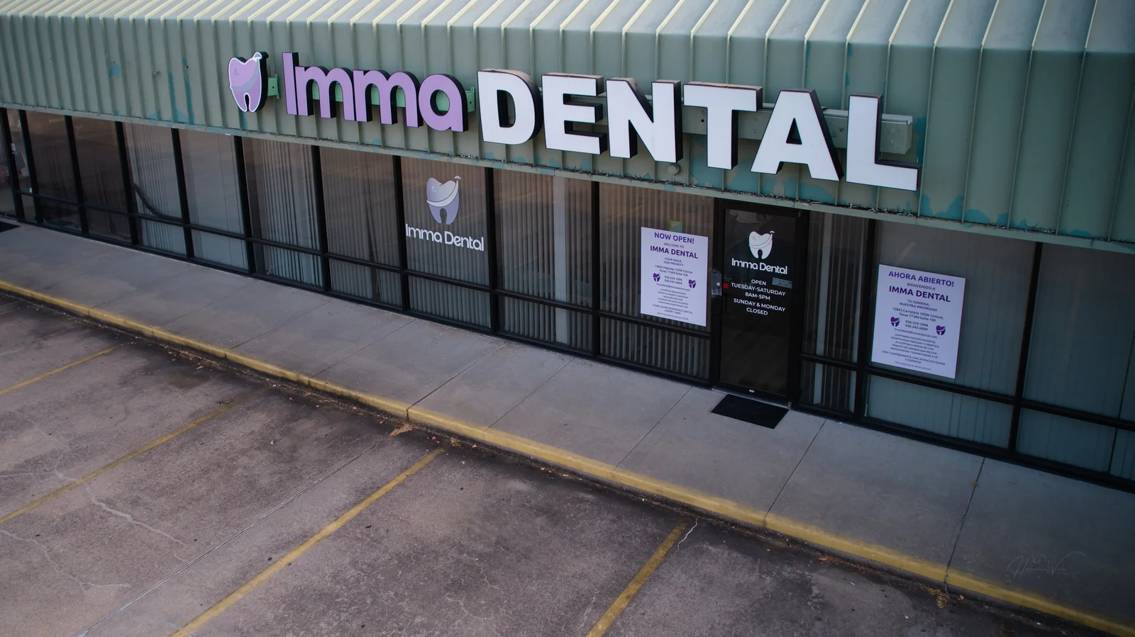 Elevated view of the Imma Dental storefront and entrance